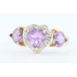 A 10ct yellow gold amethyst and diamond heart shaped rings, size M