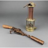 A Thomas & William miner's flame safety lamp, a Raybone Military issue 30ft tape measure with