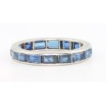 A platinum baguette cut sapphire eternity ring, size K