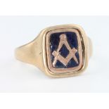 A gentleman's 9ct yellow gold and blue enamelled Masonic swivel ring size N