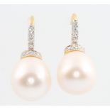 A pair of 18ct yellow gold diamond and cultured pearl earrings, diamonds approx. 0.66ct