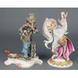 A Capodimonte figure of a doctor 9", ditto of a tramp 10" The Dr is holding a chipped syringe