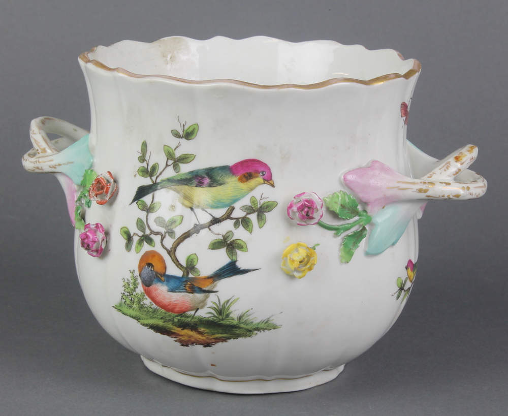 A 19th Century German 2 handled pot decorated with birds amongst flowers with encrusted flowers