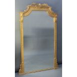 A 19th Century shaped plate mirror contained in a decorative gilt frame with acanthus leaf