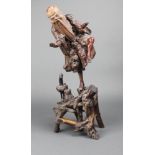 An 18th/19th Century Japanese carved rootwood figure of a standing Deity 20" There is damage to