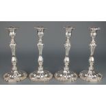 A set of 4 silver plated candlesticks with waisted stems and beaded decoration 10 1/2"