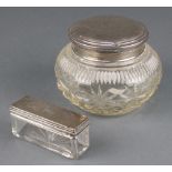 A silver mounted cut glass dressing table jar, Birmingham 1925, a Victorian ditto London 1851 The