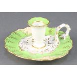 An 19th Century porcelain chamberstick with green and gilt decoration 5"