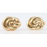 A pair of 9ct yellow gold whorl earrings