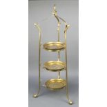 A 1930's brass 3 tier cake stand with detachable trays 34"h x 9" diam.