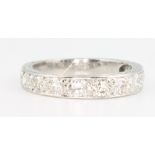 An 18ct white gold half eternity ring size H