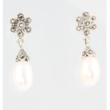 A pair of paste and pearl earrings