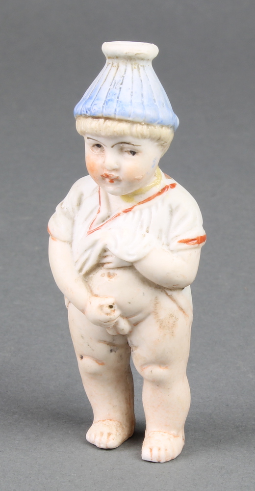 An usual Victorian bisque scent bottle in the form of a young boy 3 1/2" The head is stuck