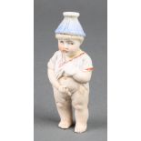 An usual Victorian bisque scent bottle in the form of a young boy 3 1/2" The head is stuck