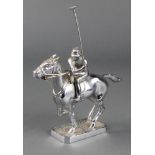 A Lejeune chrome car mascot in the form of a polo player 7" x 6" x 1 1/2" The polo stick is slightly