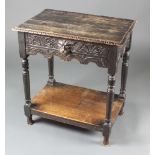 A Victorian carved oak side table fitted a drawer, raised on turned supports with undertier 28"h x