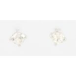 A pair of 18ct white gold diamond ear studs, each approx 0.25ct