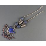 A white metal and lapis lazuli hardstone necklace