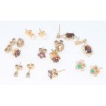 Seven pairs of 9ct yellow gold gem set earrings