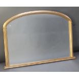 A 19th Century arched plate over mantel mirror contained in a decorative gilt frame 33 1/2" x 49"