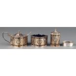 A Georgian style 3 piece silver condiment pierced and engraved decoration salt, mustard and pepper,