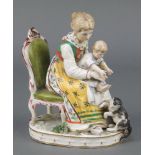 A 19th Century Austrian group of a mother, child and cat 6" This item has a stuck head and has