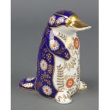 A Royal Crown Derby Imari pattern duck bill platypus paperweight with stopper 5"
