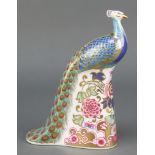 A Royal Crown Derby Old Imari pattern Derby peacock paperweight with gold stopper no.570/750 7 1/2"