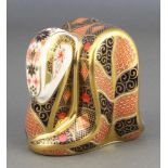 A Royal Crown Derby Imari pattern python paperweight with gold stopper 3 1/2"