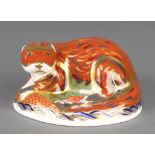 A Royal Crown Derby Imari pattern otter paperweight with gold stopper 4 1/2"