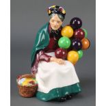 A Royal Doulton figure - The Old Balloon Seller HN1315 8"