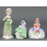 Three Royal Doulton figures - Monica HN1467 4 1/4", Top O'The Hill HN2126 4" and Ruth HN2799 6"