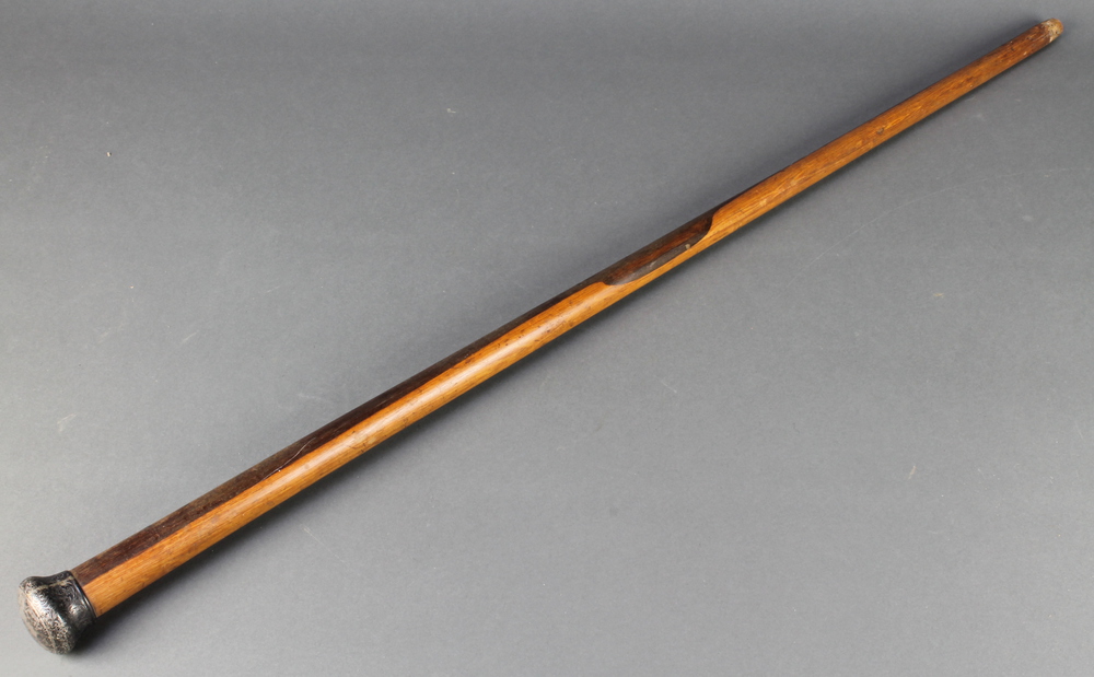 A Victorian turned lignum vitae cane with silver terminal, missing feral Birmingham 1892