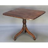 A 19th Century rectangular mahogany snap top breakfast table with iine inlay, raised on pillar and
