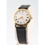 A lady's 9ct yellow gold wristwatch inscribed J W Benson London, on a leather strap
