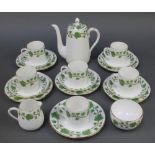 A Crown Staffordshire part coffee set decorated with leaves and berries comprising coffee pot,
