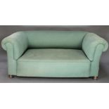 A pair of Edwardian drop arm Chesterfield settees upholstered in blue buttoned material 26"h x 57"