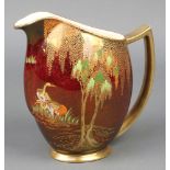 A Carlton Ware Rouge Royale jug decorated with heron beneath wisteria 7" There is rubbing to the