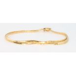 An 18ct yellow gold smooth link bracelet 12.3 grams