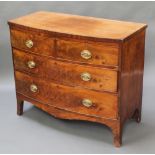 A Georgian mahogany bow front chest of 2 short and 2 long drawers raised on splayed bracket feet