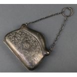 A novelty silver purse with chased floral decoration Birmingham 1916