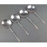 4 Edwardian silver serving spoons with fancy shell and scroll handles William Hutton and Sons London