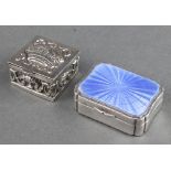 A repousse silver square box decorated with a crown Birmingham 1977 1" together with a silver and