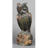 A carved hardstone figure of an owl on a tree trunk 11" x 4"
