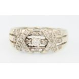 A 9ct yellow gold diamond set ring size K