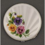 A silver and guilloche enamel circular compact decorated with pansies Birmingham 1948