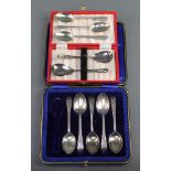 5 silver teaspoons with chased decoration Sheffield 1913, a cased pair of plated serving spoons,