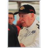 John Surtees, a signed colour photograph of John Surtees wearing a baseball cap