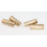 A pair of 9ct yellow gold ribbed cufflinks, 10.8 grams