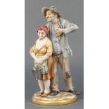 A Capodimonte group of a couple standing holding a bucket 10"